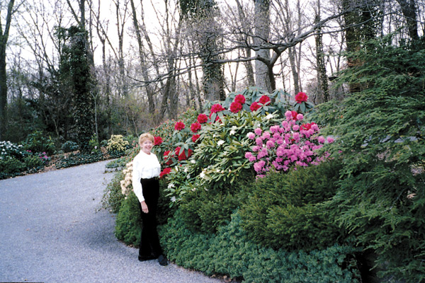 Marianne Feller and the red
Rhododendron 'Taurus'