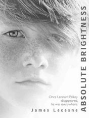 The cover of the book Absolute Brightness, with the face of a freckled boy on the cover