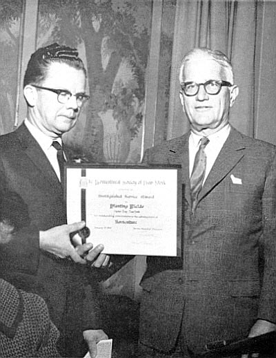 Gordon E. Jones accepting award