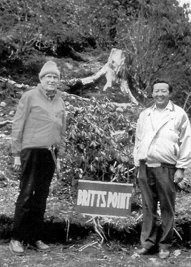 Sonam Lachungpa and 
Britt Smith in Kyangnosla Rhododendron Sanctuary, Britt's Point, May 1992.