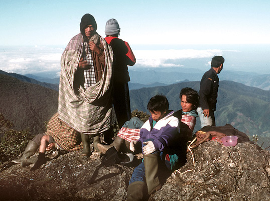 Our porters on a small
knoll at Pos 7.