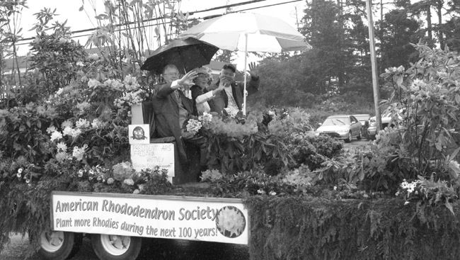 Fred Whitney, Ann Whitney and Mike
Bones on the Siuslaw chapter's float in the Rhododendron Festival parade.